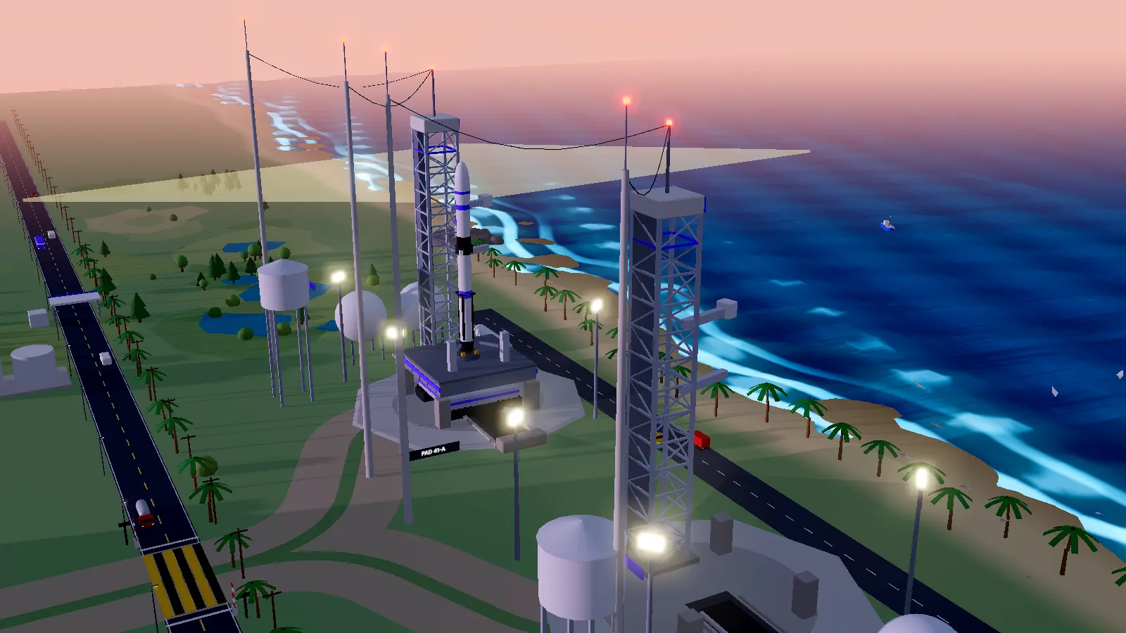 USG Spaceport launch pad with a rocket on the pad by the coast